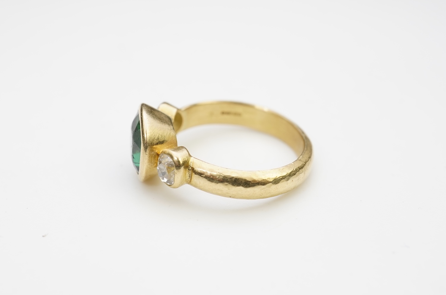 A green tourmaline and diamond ring